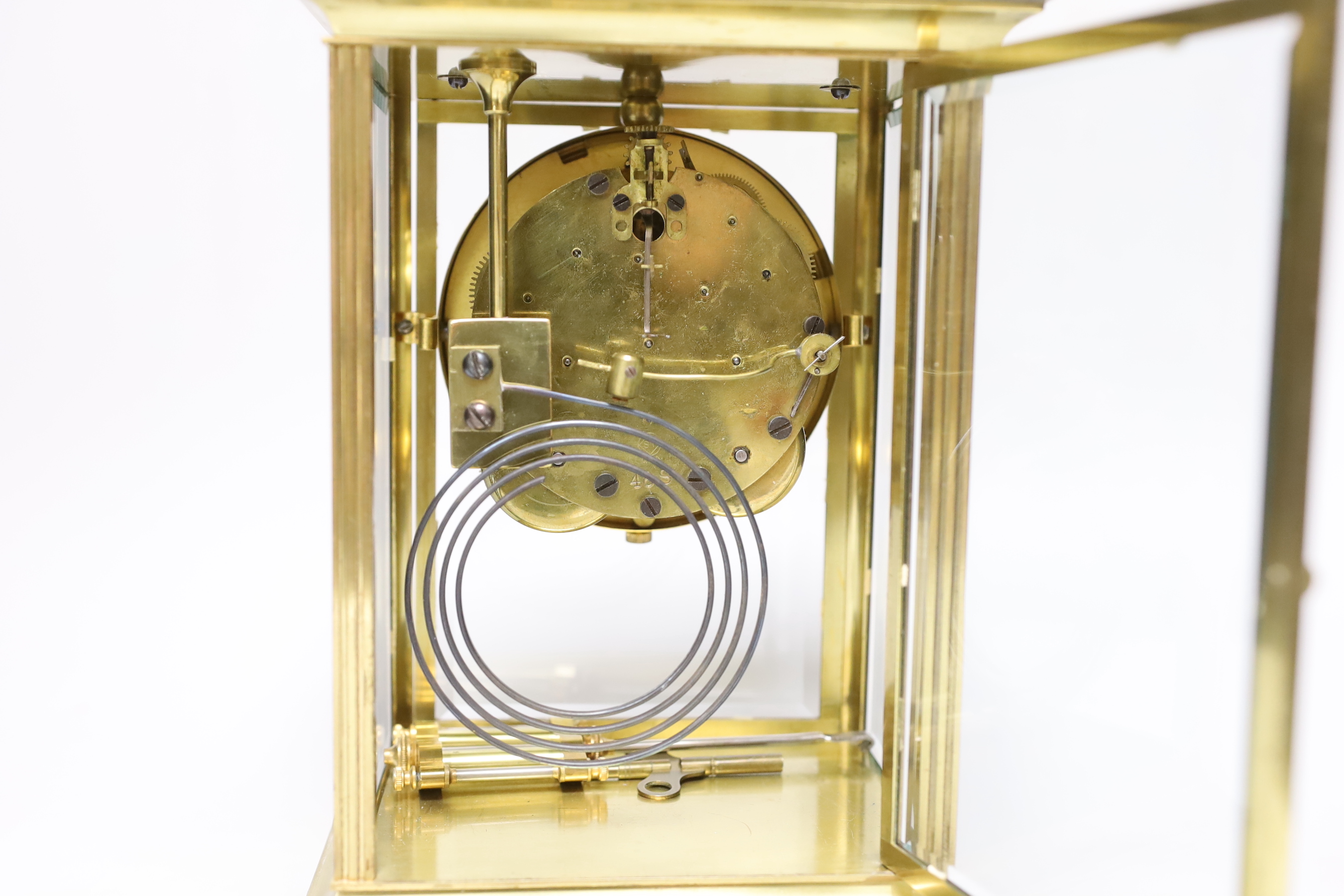 A Seth Thomas four glass mantel clock with mercury pendulum, 25cm